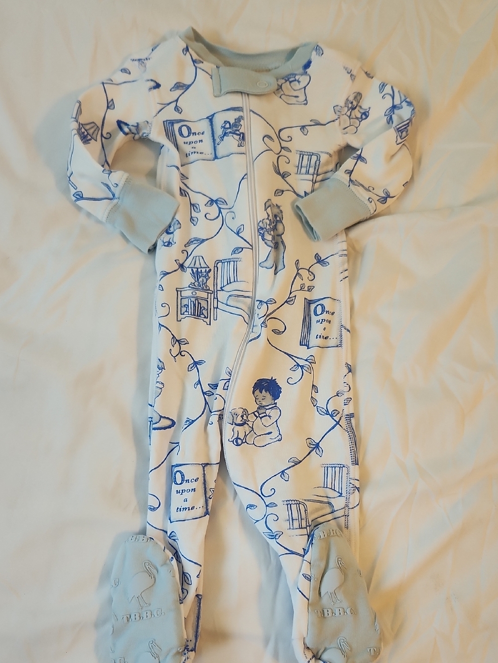 The Beaufort Bonnet Company White One-Piece with Blue Storybook Print